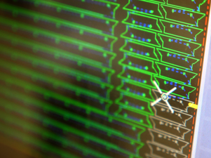 A close up of a computer screen with green and blue lines - Nesting software integrated with Monitor ERP