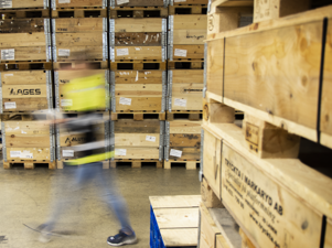 Warehouse staff managing inventory with Advanced Stock Management in Monitor ERP