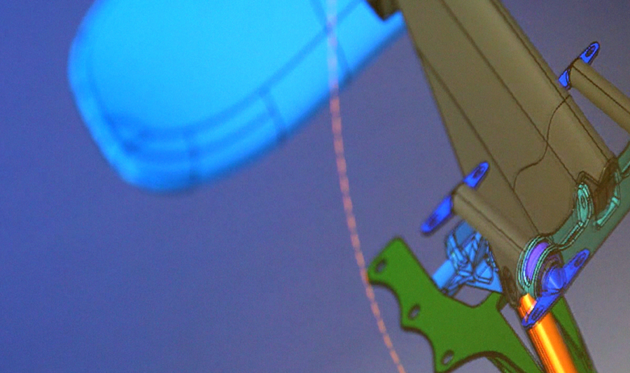 A close up of a kite flying in the sky.