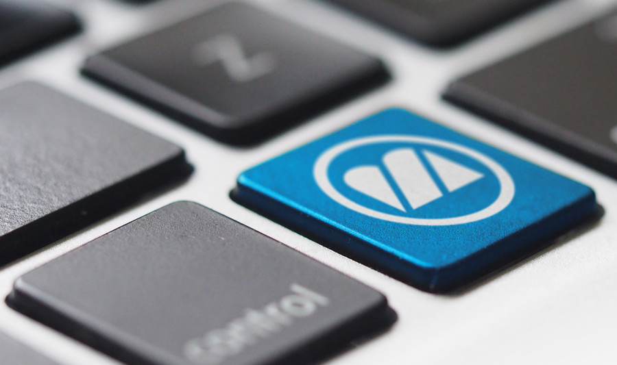 Keyboard showing the Monitor ERP logo as a shortcut. 