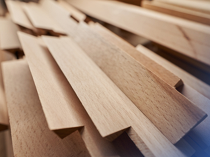 A close up of some wood planks on a table.