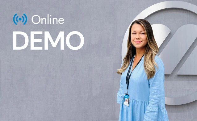 A woman standing in front of a wall.