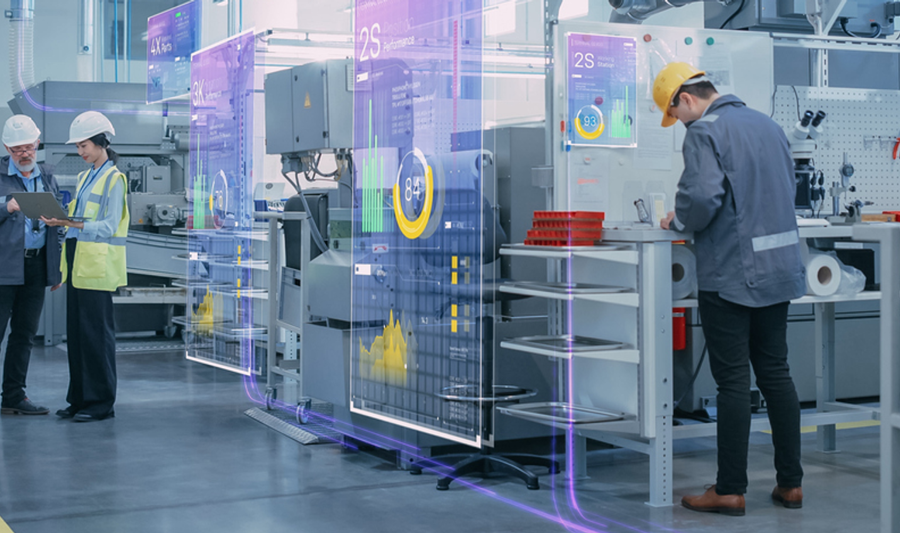 En grupp människor som står runt en maskin.