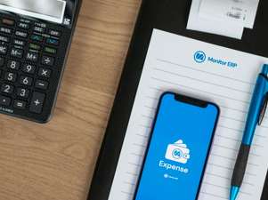 Smartphone showing employee expense reporting and receipt management in Monitor Expense